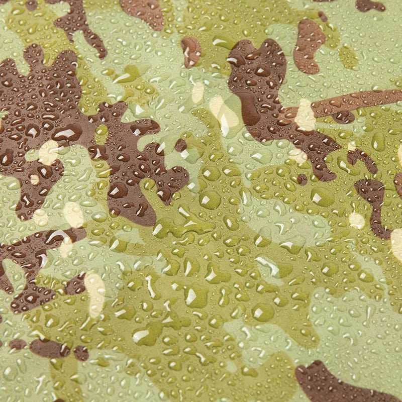 Poncho impermeable de camuflaje
