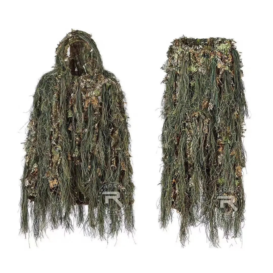 Chaqueta de camuflaje ghillie para airsoft con diseño de follaje denso, optimizada para actividades tácticas y equipamiento de camuflaje en ambientes forestales y rurales.