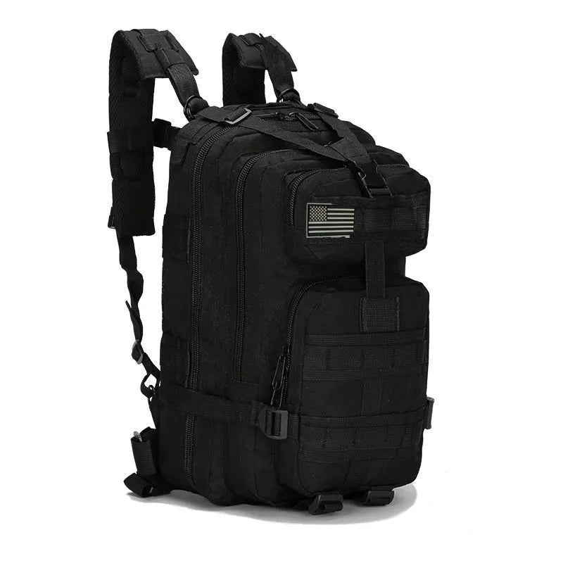 Mochila táctica negra con sistema de correas ajustables y sistema MOLLE, diseñada para portar equipamiento de airsoft y artículos de misión.